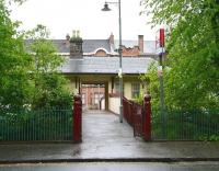 Entrance to Maxwell Park station from Terregles Avenue on a wet Sunday morning in May 2007.<br><br>[John Furnevel 06/05/2007]