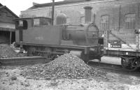 Ex-North London Railway 0-6-0T no 58850 at Rowsley shed, thought to be around 1960, the year of its eventual withdrawal by BR. The locomotive spent its final years working on the Cromford and High Peak line. 58850 is now preserved on the Bluebell Railway.<br><br>[K A Gray //1960]