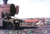 A small section of Woodham Brothers scrapyard, Barry, in 1974.<br><br>[Ian Dinmore //1974]