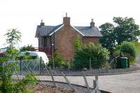 The former station at Innerwick on the ECML, closed to passengers in 1951 and now a private residence. View north east with the road bridge over the main line to the right. Torness nuclear power station can just be made out in the left background.<br><br>[John Furnevel 06/07/2006]