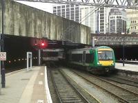 Arrival at Birmingham New Street in February 2011. Some time soon, they will have to stop imagining what they might do to rebuild New Street, and give the existing station a nice big clean.<br><br>[Ken Strachan 05/02/2011]