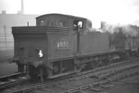 With the Bernard Brewery as a backcloth, N15 0-6-2T no 69150 shunts a wooden 'BD' container at Gorgie East yard in 1961.<br><br>[Frank Spaven Collection (Courtesy David Spaven) //1961]