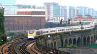 A Paris - London <I>eurostar</I> snakes along the urban viaducts through Battersea in July 2005 using the 'old route' to Waterloo International. Photographed using a long lens from the footbridge at Wandsworth Road station.<br><br>[John Furnevel 21/07/2005]