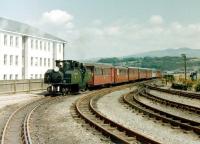 Double Fairlie <I>'Earl of Merioneth'</I> comes off The Cob in July 1981 with a train from Tanygrisiau, the then upper terminus of the line.<br>
<br>
<br><br>[Colin Miller /07/1981]