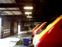 A lineup of Voyagers inside the shed at Central Rivers Depot, Burton on Trent, on 24 April 2011. Seen from the BLS special <I>Another Trent Explorer</I>, which ran through the shed on the tilt test line. [See image 33912]<br><br>[Ken Strachan 24/04/2011]