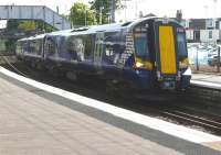 380004 arrives at Kilwinning on 6 May with the 16.20 Largs to Glasgow Central service.<br><br>[Ken Browne 06/05/2011]