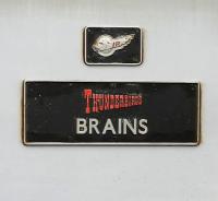Nameplate carried by Virgin 'Thunderbird' no 57309 <I>Brains</I> complete with 'International Rescue' logo. [See image 34133]<br><br>[Ken Browne 17/05/2011]