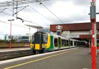 London Midland EMU 350245 arriving at Birmingham International on 17 May.<br><br>[Peter Todd 17/05/2011]