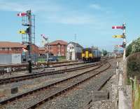 The distant semaphores shown here were temporarily out of use in January 2011 [See image 32514] as Blackpool No. 1 signal box was being demolished. It is good to see them working again (at least until electrification) and I presume the home signal they protect is now operated from No. 2 box seen here but local information would be welcome. 150277 leaves the station on 18 May heading for Manchester Victoria. <br><br>[Mark Bartlett 18/05/2011]