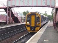 Glasgow Central bound 158730 awaits its departure time at Whifflet on 18 May.<br><br>[John Steven 18/05/2011]