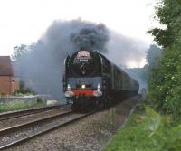 71000 <I>Duke of Gloucester</I> brings a southbound charter from <br>
Carlisle towards Bamber Bridge before joining the WCML at Farington Junction in the late afternoon of a rather dull 21 May 2011. The lighting conditions were not helped by the volumes of thick black smoke coming from the locomotive. <br>
whilst it was coasting downhill.<br>
<br><br>[John McIntyre 21/05/2011]