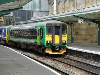 London Midland liveried 153366 bringing up the rear of 2H10, the 08.49 Leeds - Carlisle service, standing in platform 6 shortly after arrival on 19 May 2011. <br><br>[Ken Browne 19/05/2011]