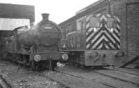 Keeping company outside the straight shed at Sunderland on 27 May 1967 are J27 No. 65880, in steam, and Gateshead based BR 204HP 0-6-0DM (later class 03) No. D2147. The roundhouse on the right was still in use, mainly for stabling J27s - my notes suggest that there were nine of them in residence there on this occasion with a further two in the straight shed.<br><br>[Bill Jamieson 27/05/1967]