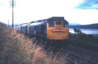 A pair of Type 2 diesels with the <I>'Hebridean Express'</I> charter train returning from Kyle of Lochalsh on 7th September 1971. The special is seen here in the late afternoon near Bunchrew on its way back to Inverness.<br><br>[Frank Spaven Collection (Courtesy David Spaven) 07/09/1971]
