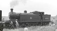 <I>All change!</I> Scene in the goods yard at Macmerry on 6 September 1958, with St Margarets C16 4-4-2T no 67492 involved in run-round manoeuvres with the SLS (Edinburgh section) Lothian lines railtour from Waverley. The East Lothian station had lost its passenger service as long ago as 1925 although the branch remained open for goods traffic until 1960.<br><br>[K A Gray 06/09/1958]