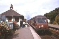 Classic scene at Arisaig in the summer of 1966, with the 'beaver tail' observation car on the rear of a Fort William-Mallaig train. This was one of two such vehicles built for a special train to mark the coronation of King George VI in 1937, and subsequently deployed on the LNER's express 'Coronation' service between London and Edinburgh. <br><br>[Frank Spaven Collection (Courtesy David Spaven) //1966]