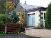 Part of the modified 1866 station at Clovenfords on the Peebles loop. Closed with the line in 1962 the building is now an attractive private residence. Photographed on a rainy afternoon in October 2006. [See image 5658]<br><br>[John Furnevel 30/10/2006]