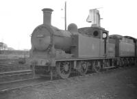 Reid N15 0-6-2T no 69174 stands in the shed yard at Carlisle Canal in the spring of 1959.<br><br>[Robin Barbour Collection (Courtesy Bruce McCartney) 14/03/1959]