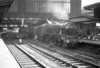 Jubilee 45562 <I>'Alberta'</I> has recently arrived at Carlisle platform 3 on 12 August 1967 with the 6.40am Birmingham - Glasgow via Leeds. The black 5 on the centre road displaying 1S52 on its smokebox door is waiting to take the train forward.<br><br>[Robin Barbour Collection (Courtesy Bruce McCartney) 12/08/1967]