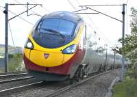 A northbound Pendolino passing Symington on 30 May 2011.<br>
<br><br>[Bill Roberton 30/05/2011]