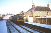 Platform scene at Shankend on 28 December 1968, with little more than a week to go before the last scheduled operations over the Waverley route. The train is the 9.30am Edinburgh - Carlisle (carrying through coaches for St Pancras) and the locomotive in charge is Brush Type 4 no 1536. [The same train was photographed by Kenneth Gray less than 20 minutes earlier as it entered Hawick station, some 7 miles to the north.] [see image 32092]. <br>
<br><br>[Robin Barbour Collection (Courtesy Bruce McCartney) 28/12/1968]