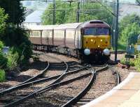 WCRC 47790, sporting its new livery, about to bring the ECS of the <I>Northern Belle</I> over the junction and onto 'wrong line' working at Westerton on 3 June. The original intention was to stable the ECS at Mossend but due to late running it went to Cadder yard instead.<br><br>[Ken Browne 03/06/2011]