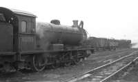 By 1967 the allocation at Sunderland was down to just over 20 locomotives and most of them could be stabled under cover. Not so lucky was Q6 no 63395 which is standing outside the straight shed in steam on 27 May. Beyond the Q6 is the smokebox of dumped K1 no 62012 while WD no 90200 is in steam at the far end of the yard.<br>
<br><br>[Bill Jamieson 27/05/1967]