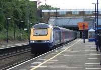 A First Great Western HST races through platform 2 at Ealing <br>
Broadway heading for Paddington on 4 June 2011. Of all the trains that passed through the station during this visit, the HST is the only one that was present on my last visit in January 1990 [see image 18890].<br>
<br><br>[John McIntyre 04/06/2011]