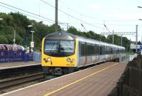 In addition to the 'Heathrow Express' there is also a stopping service running between Paddington and Heathrow Airport using class 360 emus and branded 'Heathrow Connect'. On 4 June 2011 unit 360202 arrives at Ealing Broadway platform 3 with such a service on its way to the airport, while a Central Line train is preparing to head for town at platform 5 in the background.<br>
<br><br>[John McIntyre 04/06/2011]