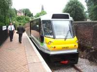 The Parry People Mover, 139001, at the Stourbridge Town terminus on 8 June after another run down the short branch from Stourbridge Junction. This flywheel driven vehicle is one of two used by London Midland for the ten-minute interval branch services. The current terminus lies just short of the original Town station [See image 18995] with the platform on the opposite side of the line.<br><br>[Mark Bartlett 08/06/2011]