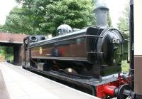 With an audience watching from the road overbridge, an immaculately <br>
turned out ex GWR 0-6-0PT no 5786 stands at Chinnor station waiting to depart with the 1540hrs service to Thame Junction.<br><br>[John McIntyre 05/06/2011]