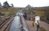 <I>'For what we are about to receive....'</I>  a group of hikers sets out under distinctly threatening skies after disembarking from a train at Corrour in October 1980.<br>
<br><br>[Frank Spaven Collection (Courtesy David Spaven) /10/1980]