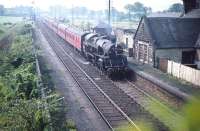 BR Standard class 4 2-6-4T no 80030 takes a Glasgow train through the closed Lochside station in August 1959. Reopened in 1966, this is the present day Lochwinnoch station (name changed in 1985).<br><br>[A Snapper (Courtesy Bruce McCartney) 21/08/1959]