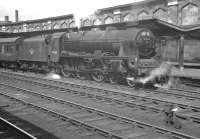 Rebuilt 'Patriot' 4-6-0 no 45532 <I>Illustrious</I>, photographed at Carlisle on 4 August 1962. The train about to be taken south out of platform 4 is the 7.37am 1M31 Aberdeen - Manchester.<br><br>[K A Gray 04/08/1962]