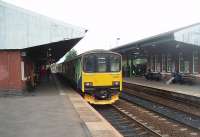 Conventional (but soon to be replaced) stock at Stourbridge Junction as 3-car Sprinter 150015 calls on a London Midland service to Dorridge via Snow Hill. The 'Parry People Mover' shuttle to the Town station leaves from the opposite side of this island platform. [See image 34453] and these Snow Hill services were expected to go over to Class 172 stock later in the year.<br><br>[Mark Bartlett 08/06/2011]