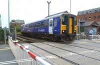 Northern unit 153352 on Brayford level crossing just after leaving Lincoln station on 17 June 2011.<br><br>[Bruce McCartney 17/06/2011]