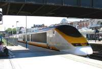 <I>'Oooohhhh Jemima... what a nice cool breeze.... '</I> With shade at a premium at Kensington Olympia on an exceptionally hot summer morning in July 2005, a 'eurostar' stirs the air as it glides swiftly past waiting commuters on platform 3. The train is running south ecs from North Pole depot to take up duty at Waterloo International. <br>
<br><br>[John Furnevel 20/07/2005]