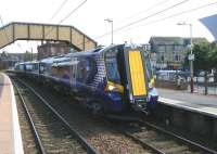 380016 about to leave Saltcoats on 20 June with a Glasgow Central - Largs train.<br><br>[Veronica Clibbery 20/06/2011]