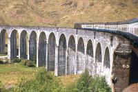 A Class 27-hauled Mallaig train eases round Glenfinnan Viaduct in 1977.<br><br>[Frank Spaven Collection (Courtesy David Spaven) //1977]