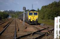 Freightliner Heavy Haul have a short term contract to move imported coal from Leith Docks to Longannet Power Station thrice-daily, via Dunfermline and Culross.<br/><br>
66548 and empties from Longannet in the down loop at Townhill.<br><br>[Bill Roberton 28/06/2011]