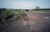 Shieldhall Yard was lifted in April/May of 1987. A very short section was left behind, seen here. The view looks to the King George V Dock approach under the M8 in May 1987.<br><br>[Ewan Crawford 19/05/1987]