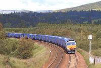 66414 heading south at Bardrill near Blackford, Perthshire, with the Stobart Empties on 30 June 2011.<br><br>[Brian Forbes 30/06/2011]