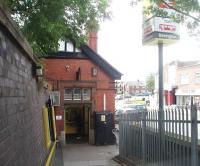 Like its neighbouring station of Port Sunlight, Bebington is a little <I>non-descript</I> at platform level [See image 34750] but the street level booking office is an attractive building in keeping with the nearby Port Sunlight 'garden village' that it also serves. A subway leads from the booking office to the down platform. <br><br>[Mark Bartlett 24/06/2011]