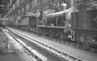 Inside Cambridge shed (31A) in May 1961, with J15 0-6-0 no 65478 in the centre of the locomotive lineup.<br><br>[K A Gray 14/05/1961]