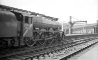 Jubilee no 45562 <I>Alberta</I> stands with a train off the S&C route at Carlisle platform 3. The train is thought to be the 6.40am Birmingham New Street - Glasgow Central and the date 12 August 1967.<br><br>[Robin Barbour Collection (Courtesy Bruce McCartney) 12/08/1967]