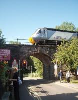 43290 leads the morning Kings Cross service out of Pitlochry and crosses Ferry Road on 28th June 2011. Having photographed the train arriving in the station [See image 34812] it took a sprint along the nearby footpaths to also capture it leaving. <br><br>[Mark Bartlett 28/06/2011]