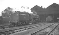 BR 9F 2-10-0 no 92024 in the shed yard at Kingmoor on 10 July 1965. Originally built as a Crosti-boilered locomotive, no 92024 was converted to conventional operation in 1960 [see image 26943].<br><br>[K A Gray 10/07/1965]