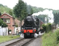 Black 5 no 45428 <I>Eric Treacy</I> brings the NYMR <I>'Moors Explorer'</I> over New Bridge level crossing on the northern edge of Pickering on 28 June 2011. The train is the 11.00 ex-Whitby.<br><br>[John Furnevel 28/06/2011]