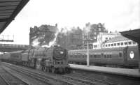 The 10.35am Glasgow Central - Blackpool North arrives at Carlisle on 26 June 1965, having run south via the G&SW route. Britannia Pacific no 70032 <I>'Tennyson'</I> is in charge.<br><br>[K A Gray 26/06/1965]