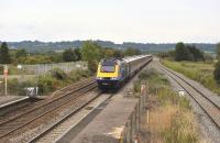 The First Great Western 14.15 London Paddington - Cardiff Central westbound through Pilning on 12 July 2011.<br><br>[Peter Todd 12/07/2011]